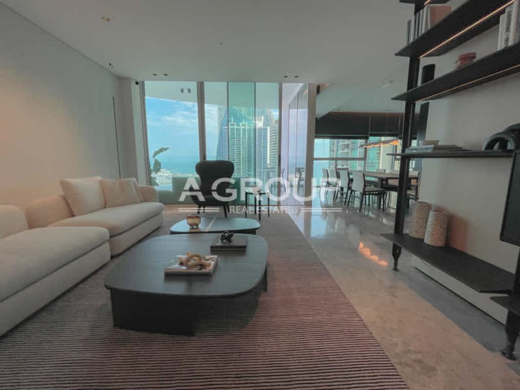 Modern open-plan living area with floor-to-ceiling ocean views in Pacific Point Tower 400 Panama
