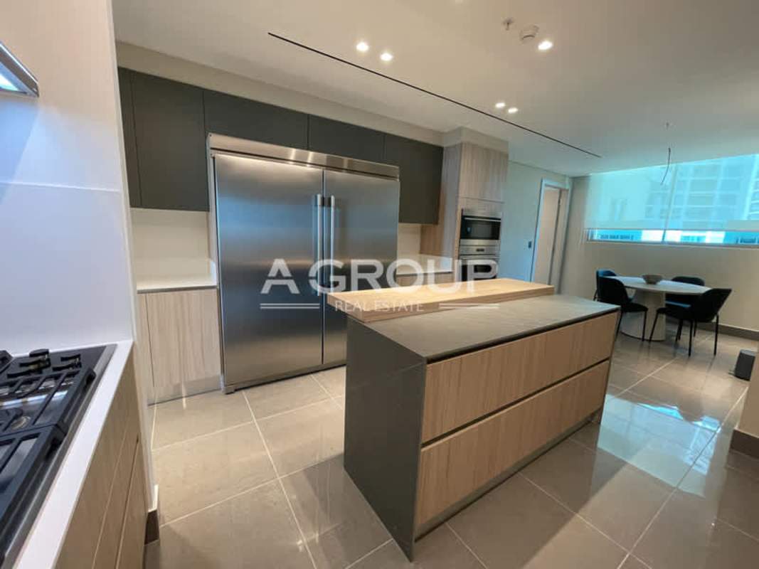 Luxury kitchen combined with dining space, marble floors Punta Pacifica real estate