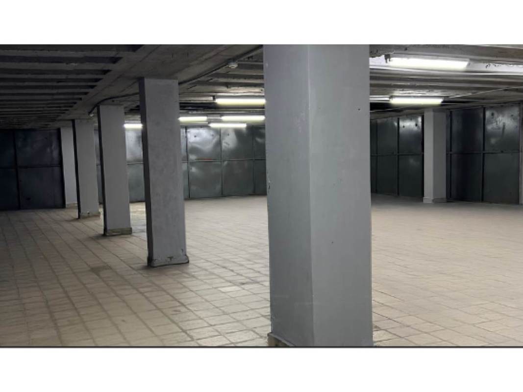 Empty industrial warehouse space with fluorescent lighting and reinforced flooring Calidonia commercial area Panama