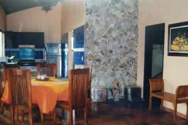 Modern kitchen with granite countertops, stainless steel appliances, window views in villa Altos del María Panama