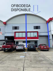 Commercial warehouse units exterior with roller shutter doors and signage in San Pablo Nuevo David Panama