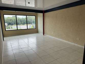Bright interior empty room tiles and window commercial warehouse office San Pablo Nuevo David Panama