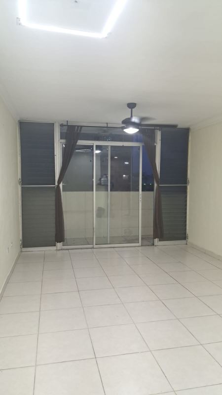 Living room with sliding glass door, tiled floor, ceiling fan in PH Torres de España Panama