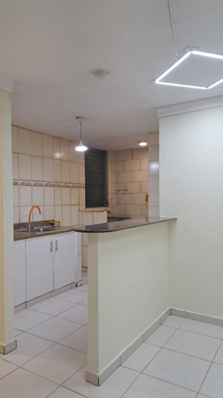 Bedroom with tiled floor, large window, ceiling fan in PH Torres de España Panama