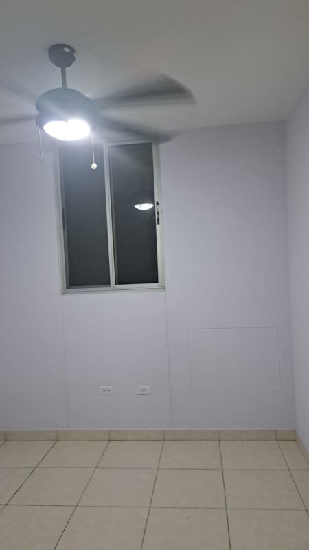 Entryway with tiled floor, wooden door and modern lighting PH Torres de España