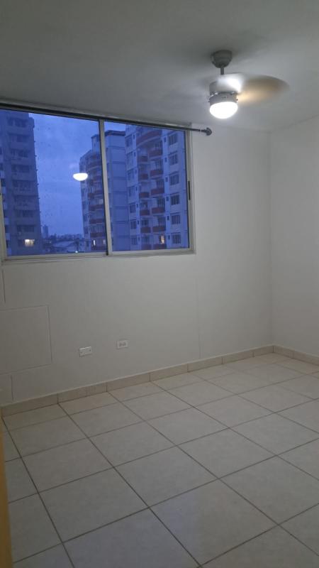 White built-in closet with shelves in bedroom apartment PH Torres de España Panama
