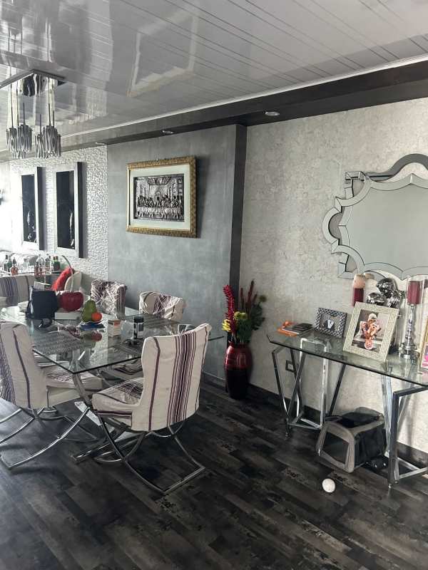 Master bedroom with ensuite bathroom and city views at PH Rokas Condado del Rey Panama