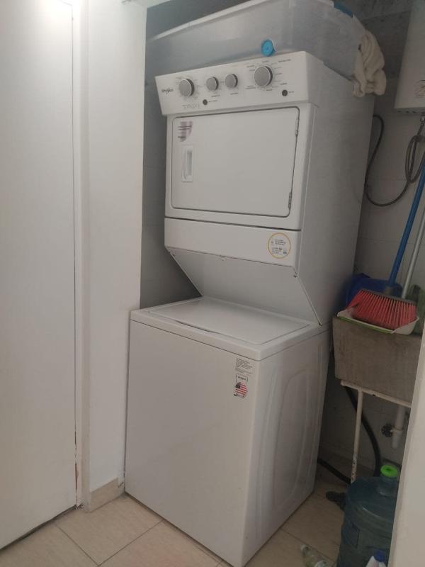 Contemporary kitchen with granite countertops, cabinets in Belview Towers apartment