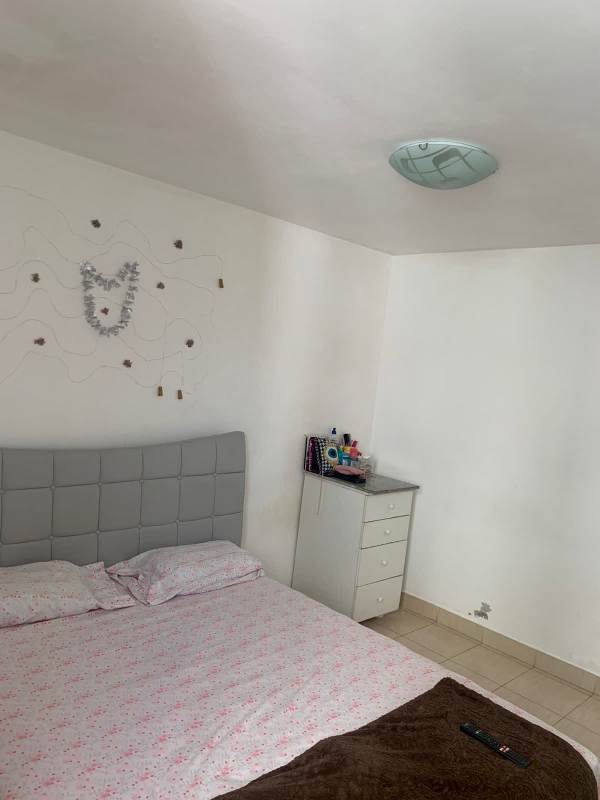 Guest bedroom with built-in closet tile floor Belview Towers Edison Park