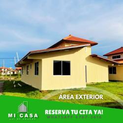 Open living room double height ceiling window view Residencial Reserva Santiago Panama