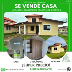 Yellow two-story house with front yard and porch in Residencial Reserva Santiago Veraguas Panama