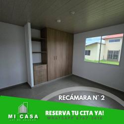 Bedroom with window and built-in wardrobe tile floors Residencial Reserva Santiago Panama