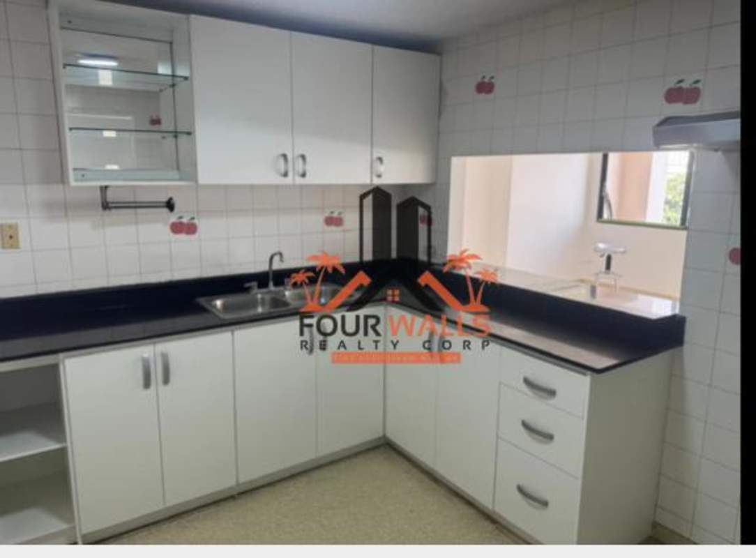 Bathroom with marble-style tiles, walk-in shower, vanity PH Marfil Panama