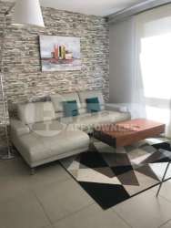 Modern kitchen with granite countertop and stainless appliances at PH Mosaic furnished rental Panama Pacifico