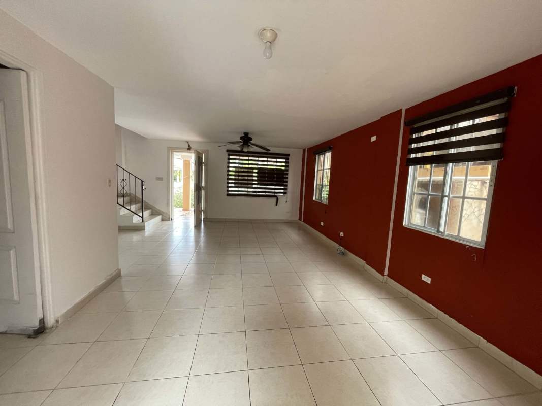 Bedroom with blue walls AC built-in closet fan Dorado Lake Condado del Rey Panama