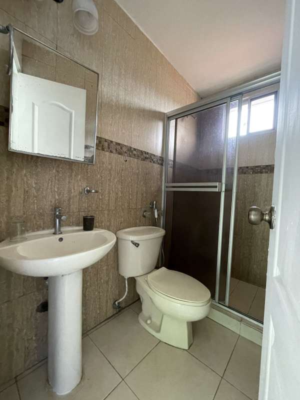 Contemporary bathroom glass shower enclosure pedestal sink Dorado Lake Panama