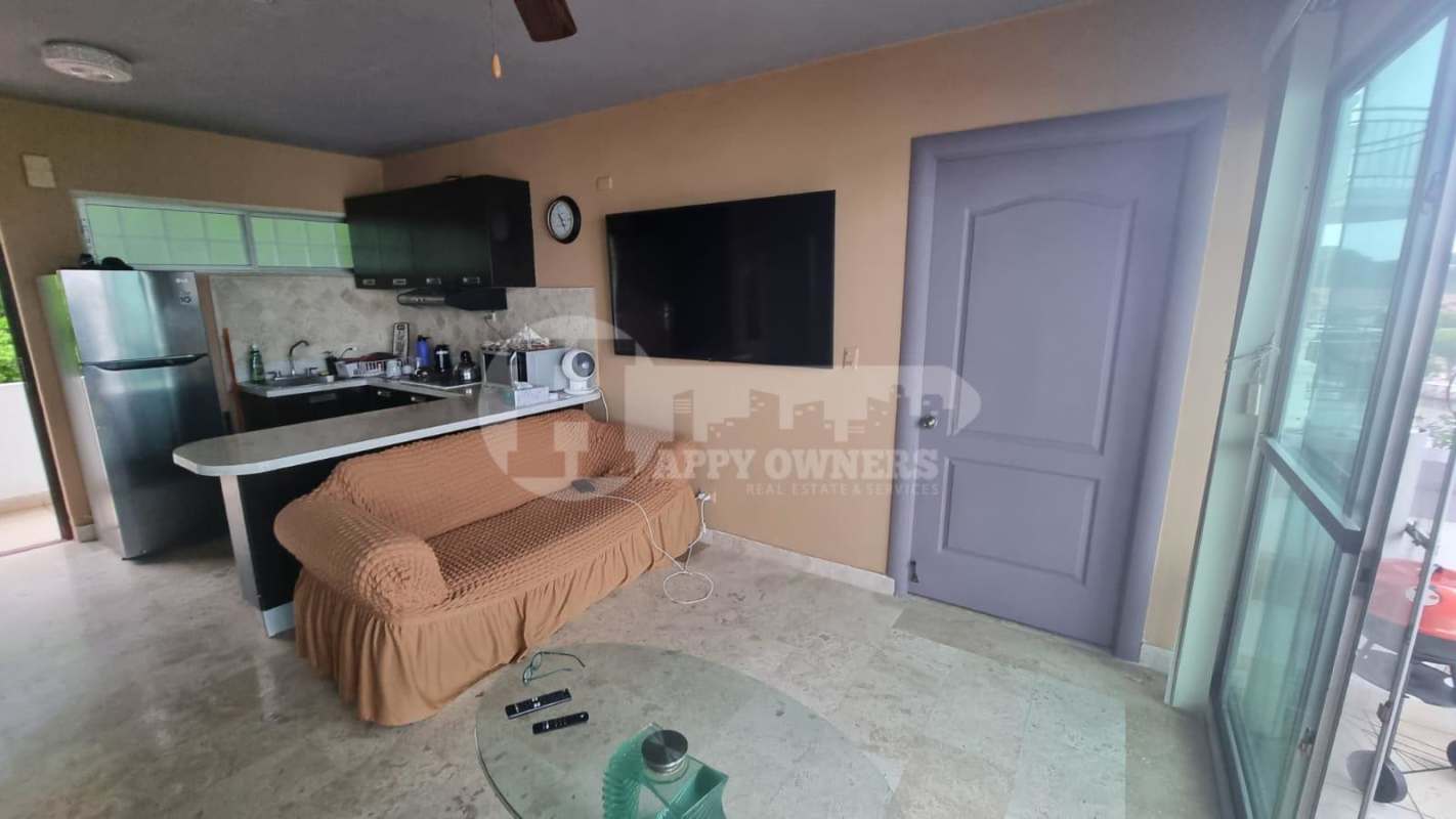 Bright living room with large windows ocean views in PH Causeway Tower Amador Panama