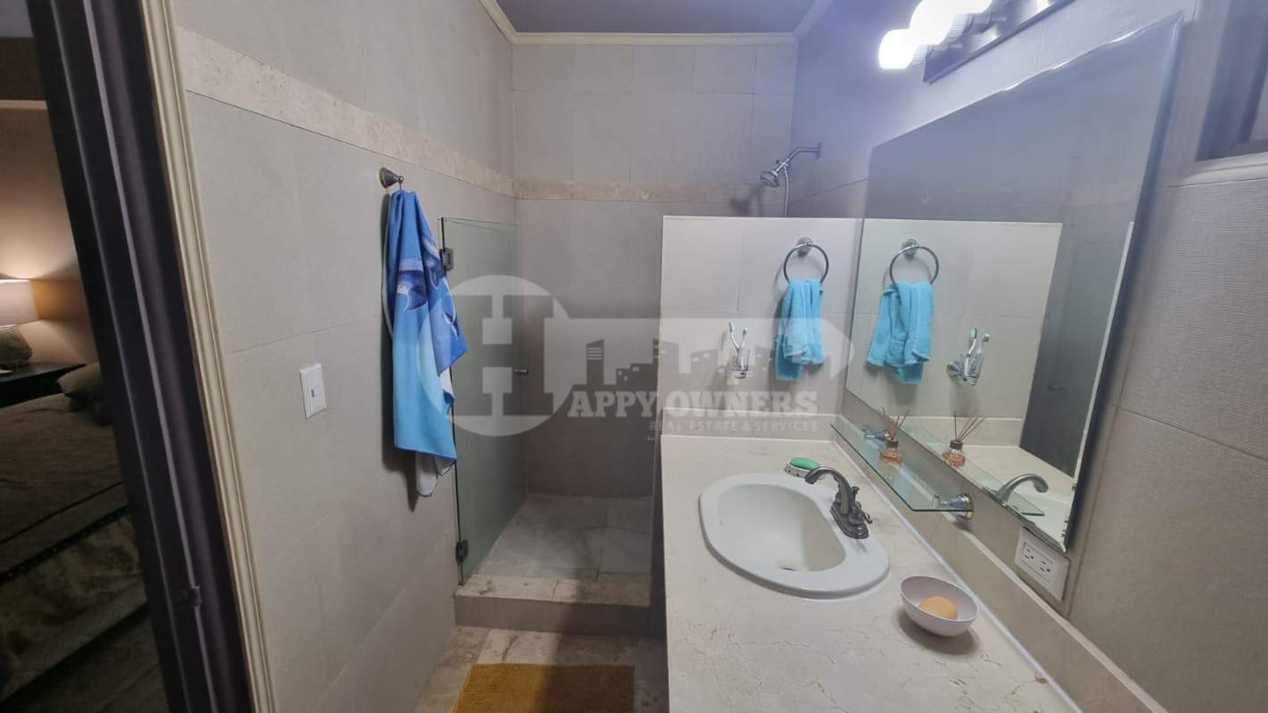 Bathroom with granite vanity and walk-in glass shower Causeway Tower Amador