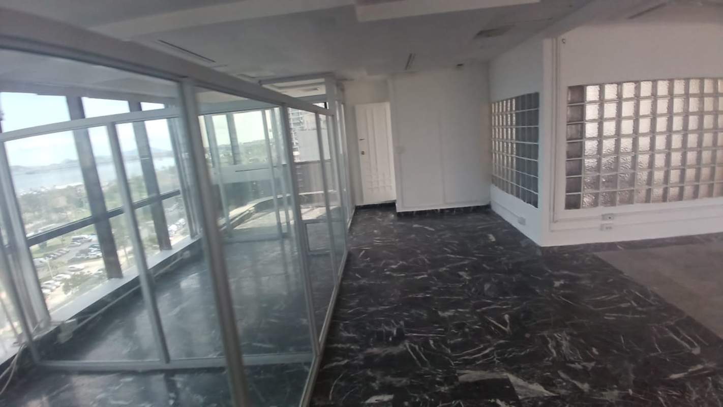 Modern office interiors glass partitions panoramic ocean city views marble flooring PH BICSA Financial Center