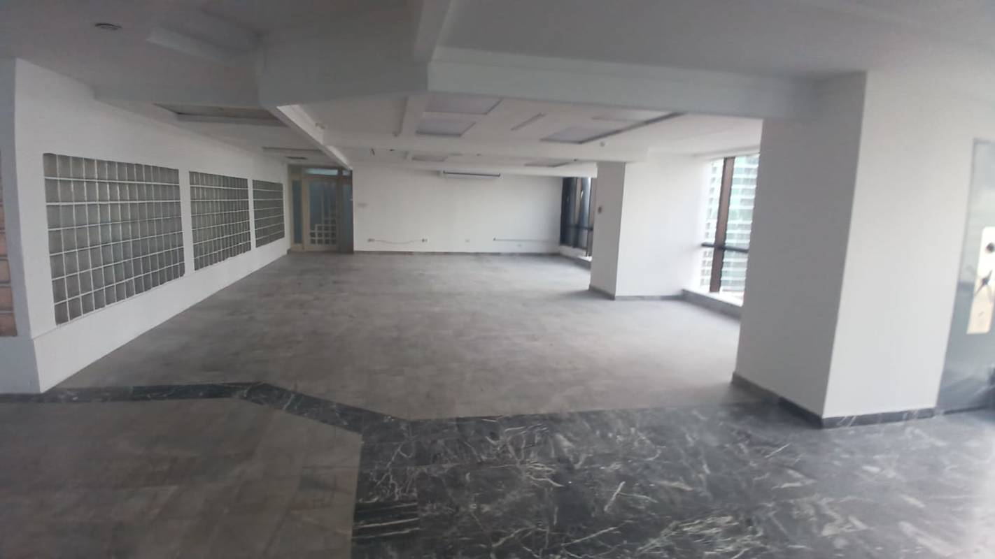 Commercial office with marble flooring glass block design floor-to-ceiling windows city ocean view PH BICSA Panama