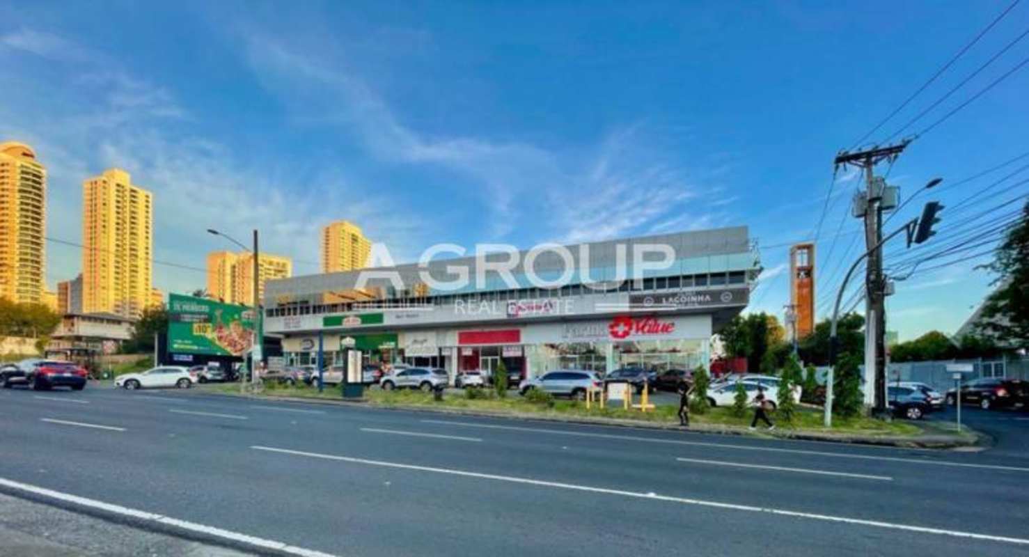 Modern building lobby tiled walls elevator and stairway at Plaza Comercial Calle 50 Obarrio Panama