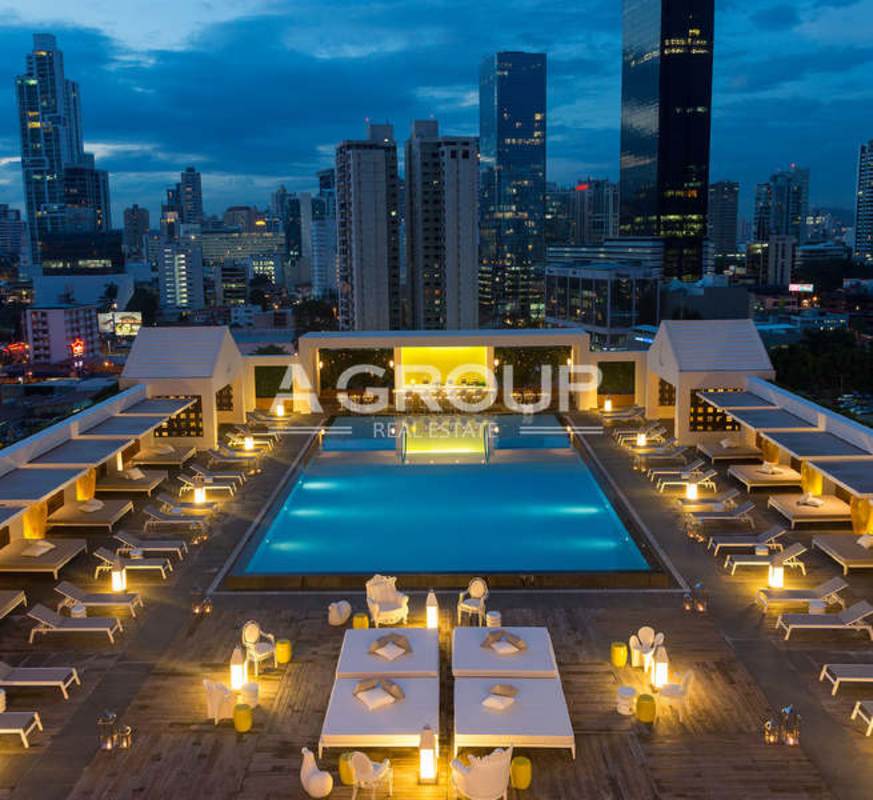 Rooftop infinity swimming pool with panoramic city and ocean views at PH Yoo Panama Avenida Balboa