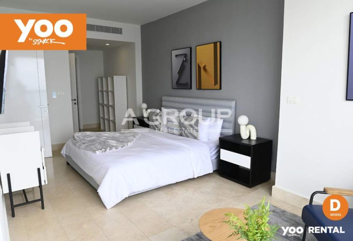 Gourmet kitchen with stainless steel appliances and island at PH Yoo Panama luxury apartment