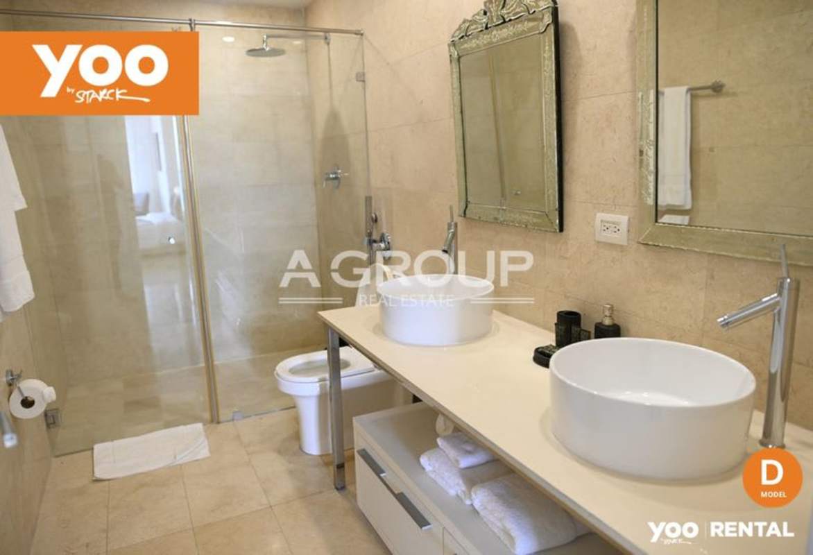 Contemporary bathroom with double vessel sinks and glass shower at PH Yoo Panama
