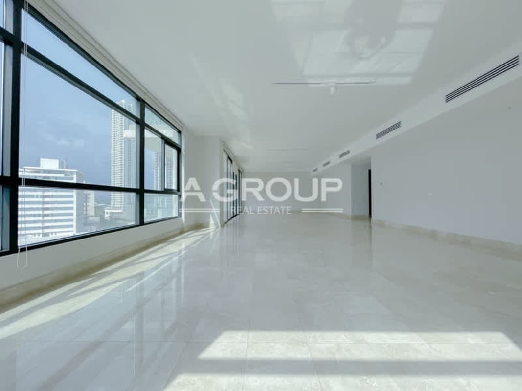 Primary bedroom with large window ocean golf views PH Albatross Santa Maria Panama