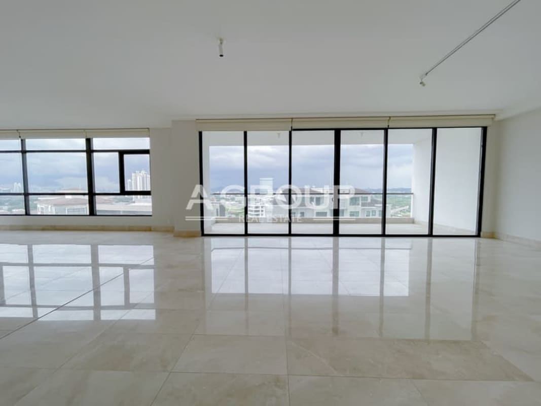 Large balcony with glass railing, panoramic views of ocean golf course city Panama