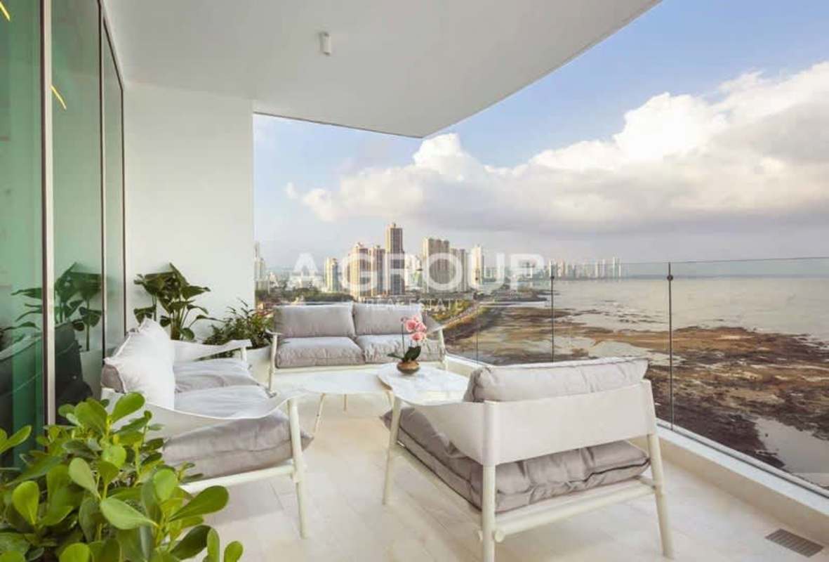 Modern kitchen with granite countertops, appliances, island in Pacific Point Tower 400 Punta Pacifica Panama