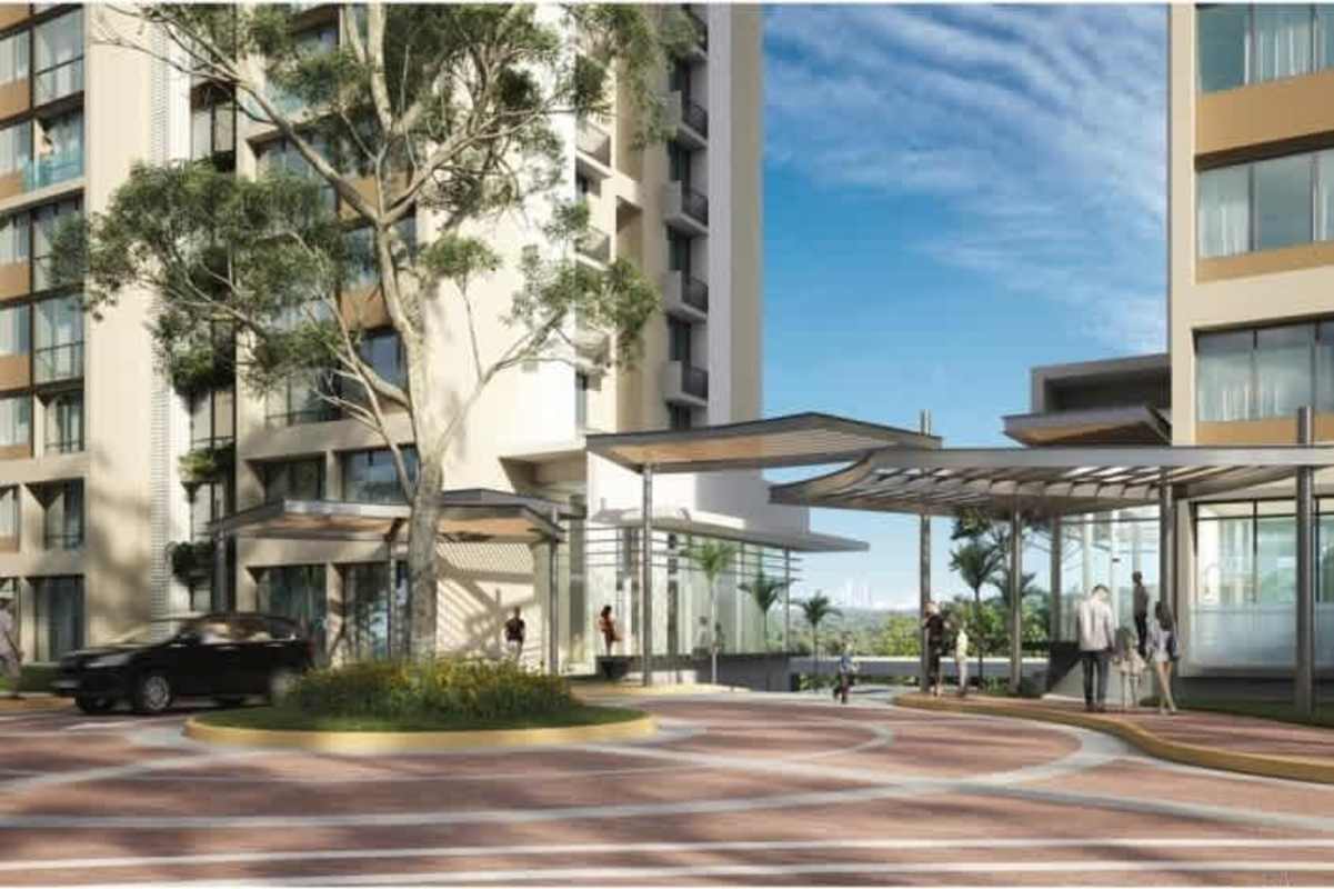 Infinity swimming pool with pergolas, deck chairs overlooking city skyline at Green City Panama Norte