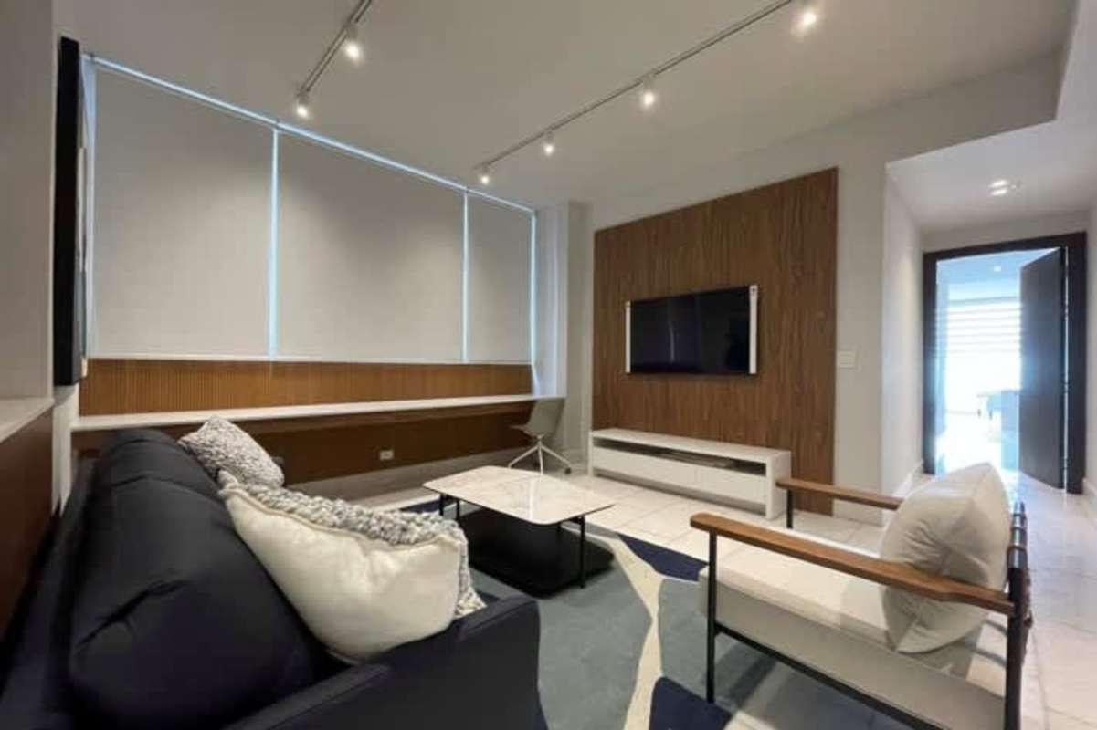 Home theater room with luxury seating and big screen PH Ocean Front Panama City