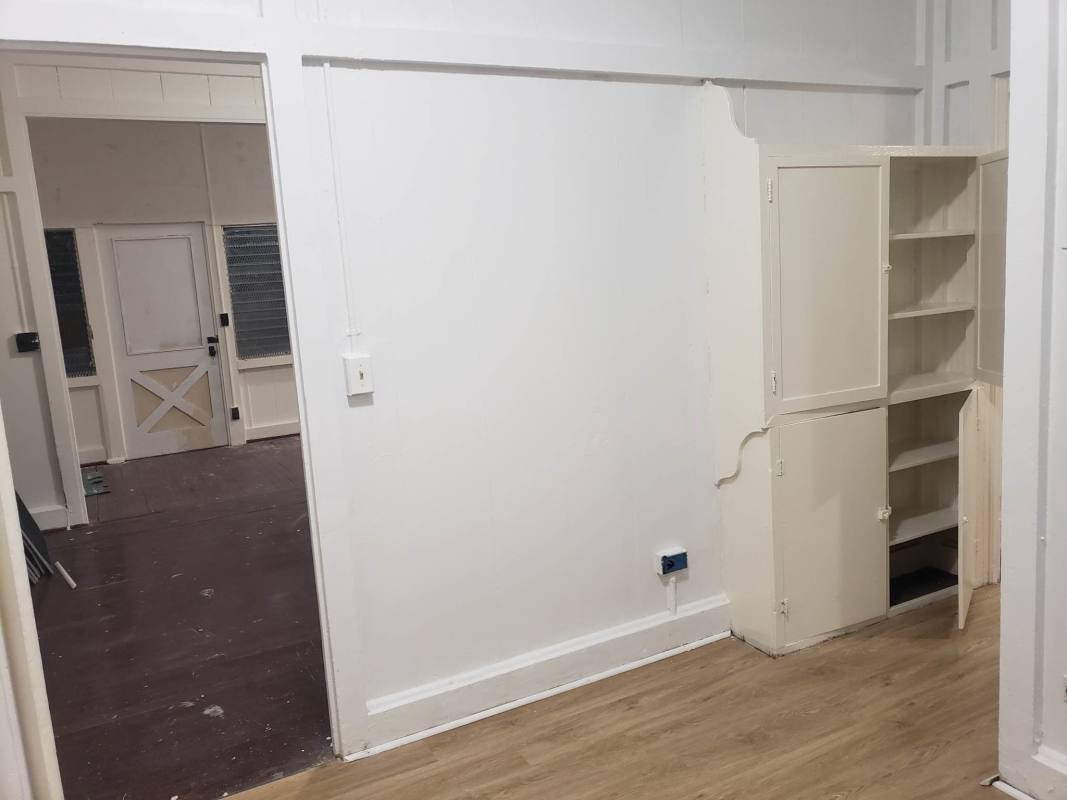 Interior hallway built-in cabinet wood floors rental duplex Balboa Panama