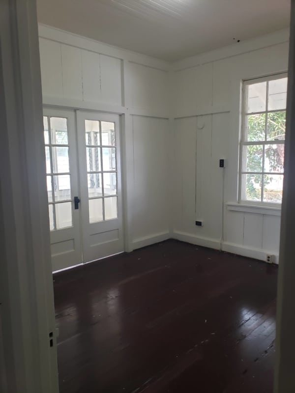 Spacious living room with dark hardwood floors and natural light near Amador Causeway Balboa Panama