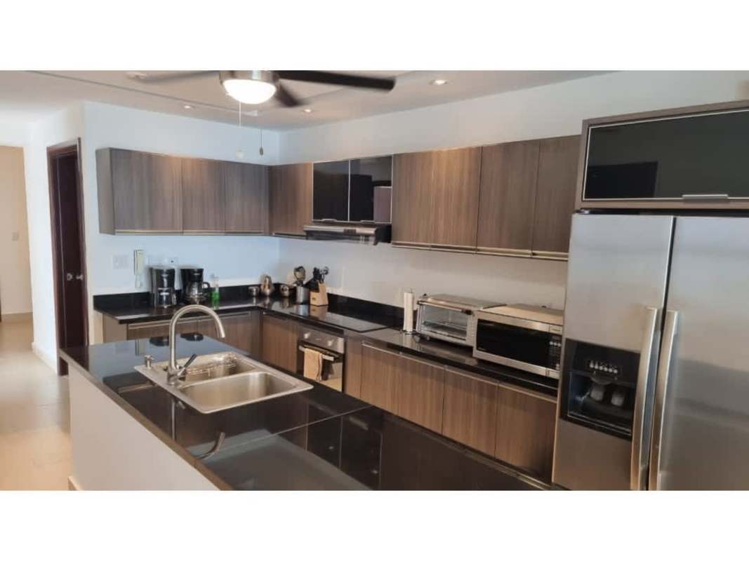 Gourmet kitchen with stainless steel appliances and ocean view in PH Rivage Penthouse Panama