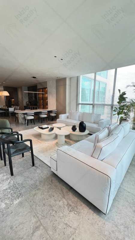 Open concept dining and living area with marble flooring, modern furniture, oceanviews at Sea Point Punta Paitilla Panama