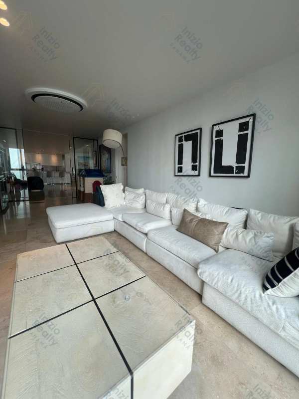 Open plan dining and kitchen area in luxury oceanfront PH Ocean Sky apartment Panama