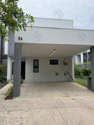 Bright open living room with large windows and neutral decor in Panama Pacifico Howard luxury home