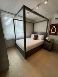 Contemporary kitchen with granite countertops and American breakfast bar in luxury Panama Pacifico house