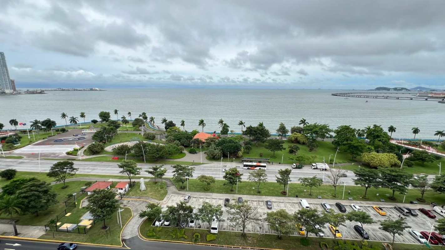 Private balcony with panoramic ocean and Panama City skyline view at PH BICSA Tower
