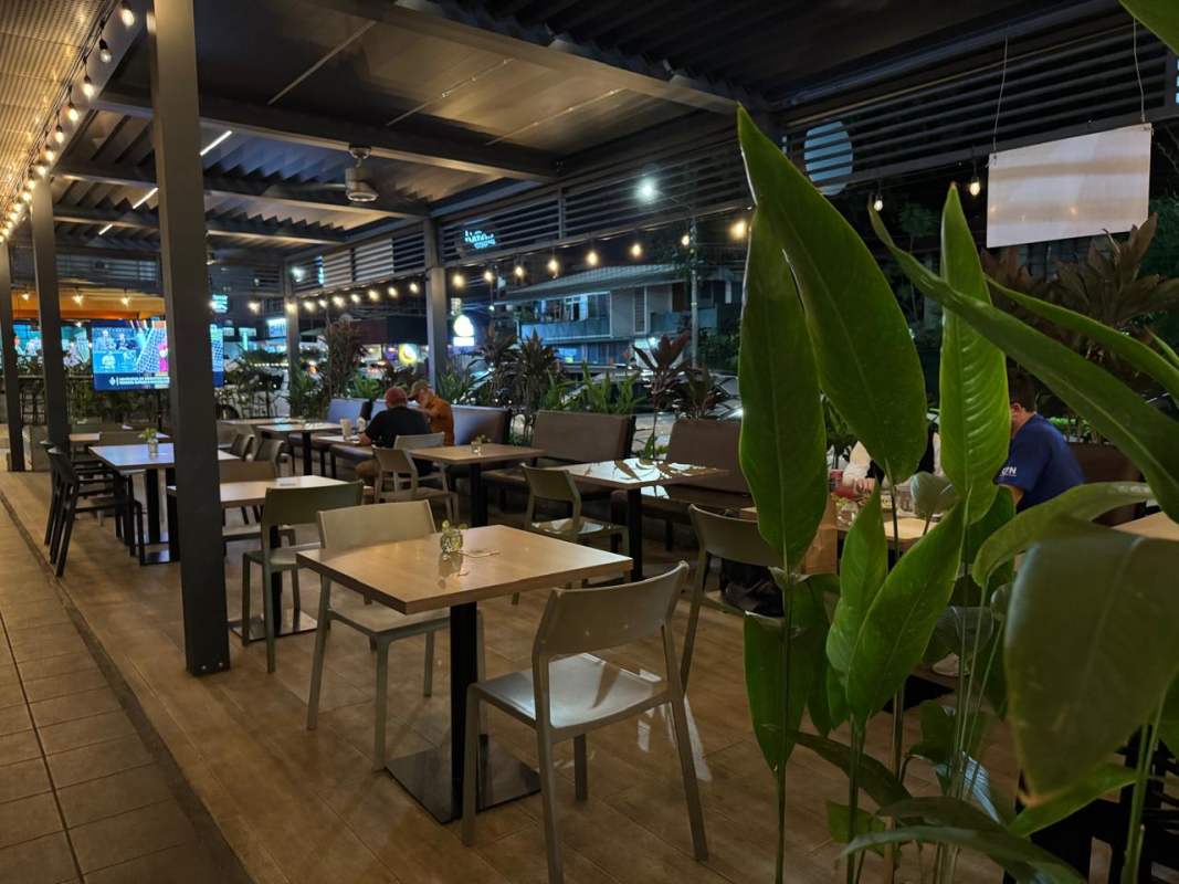 Spacious warehouse or storage area with exposed metal ceiling and concrete floor in commercial plaza Panama City San Francisco
