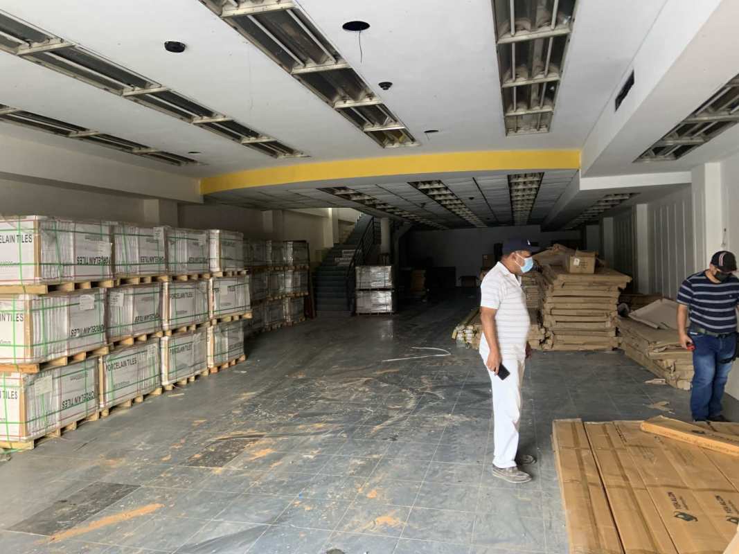 Warehouse area of commercial property showing stacked tiles and storage space Calidonia Panama City