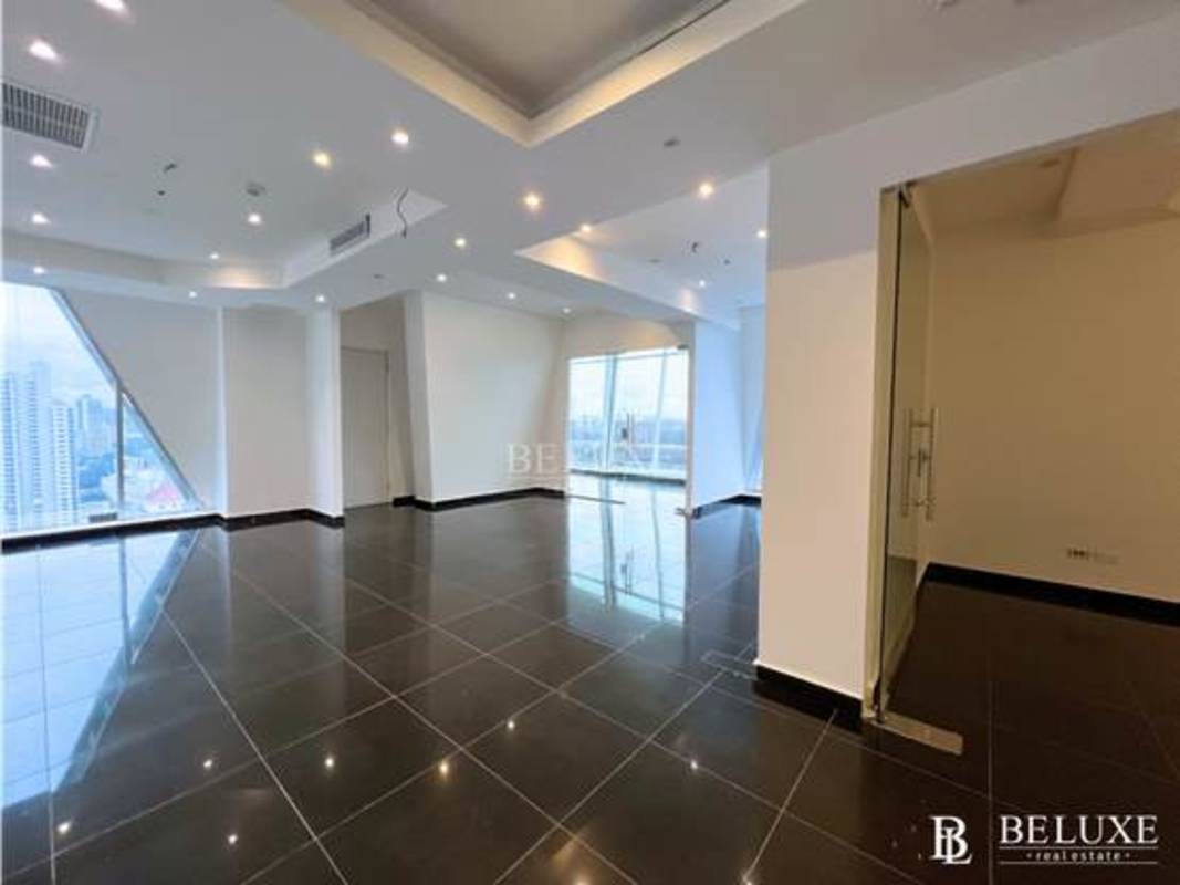 Elegant corporate lobby with glossy tile floors and elevators at PH SL55 Optima Tower Obarrio