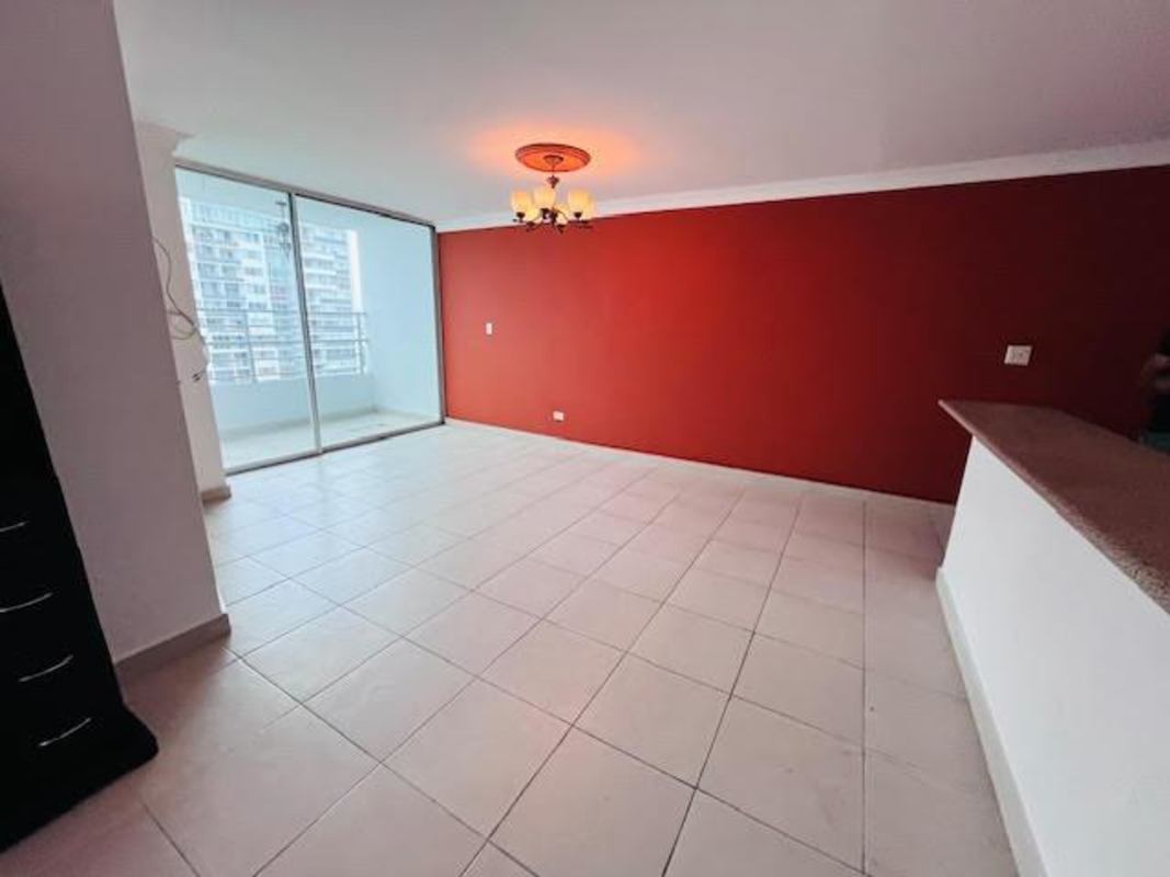 Spacious living area ceramic tile floor sliding doors to balcony Central Park Pueblo Nuevo Panama