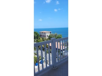 Balcony with seascape views overlooking Playa Corona beachfront, San Carlos Panama