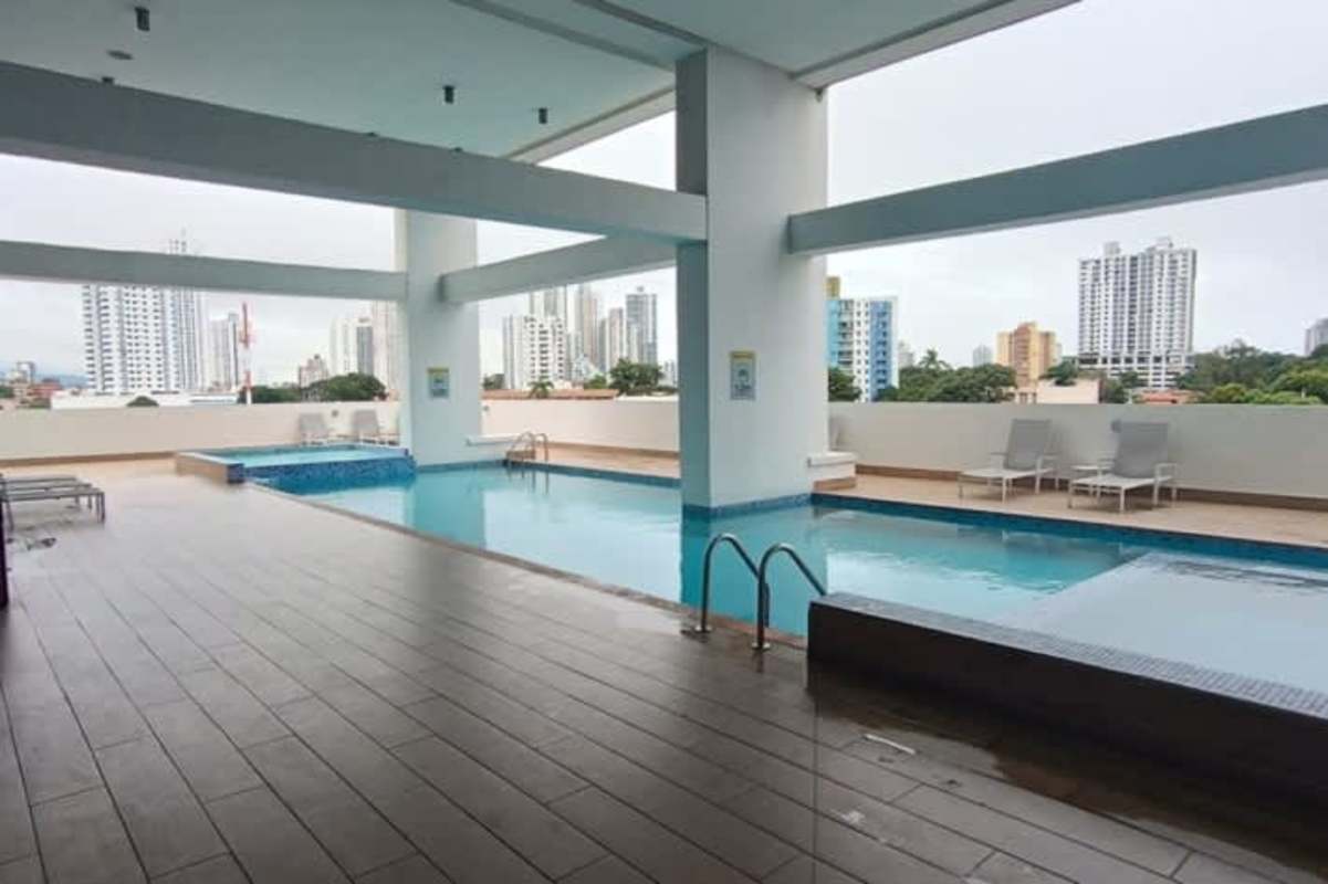 Covered outdoor swimming pool with city view in PH Carrasquilla Park Panama