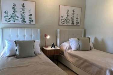 Spacious bedroom with modern decor at PH Brisas de Mar Playa Caracol Panama