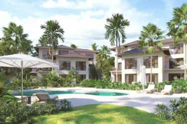 Spacious living room with balcony views of ocean, bright modern decor at PH Brisas de Mar Punta Chame Panama