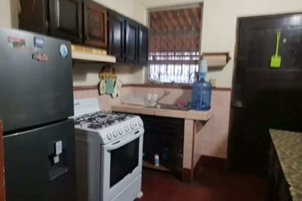 Kitchen with granite countertop gas stove double sink Betania Panama house